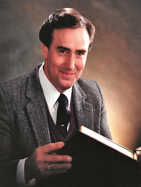 Photo of Photo of Evangelist Roy Brewer with Bible