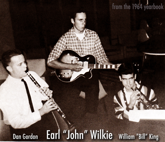 John Wilkie playing guitar from 1964 yearbook
